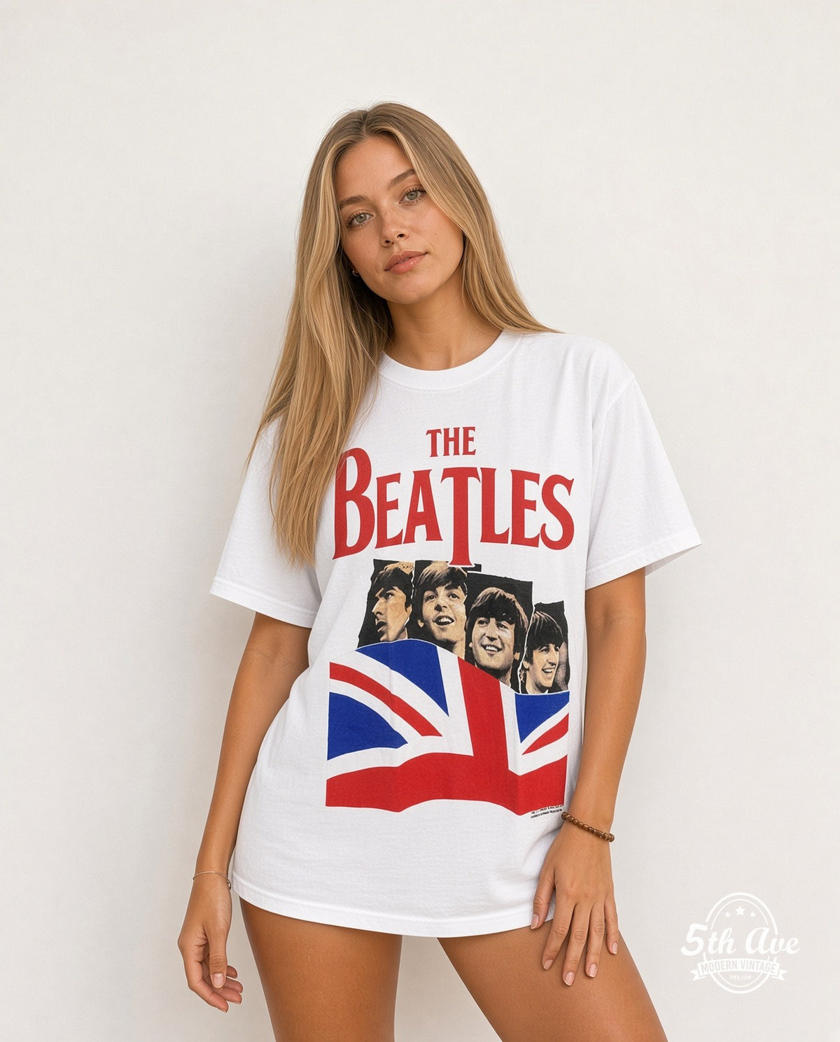 Model wearing The Beatles Union Jack Red Logo White vintage band t-shirt in white