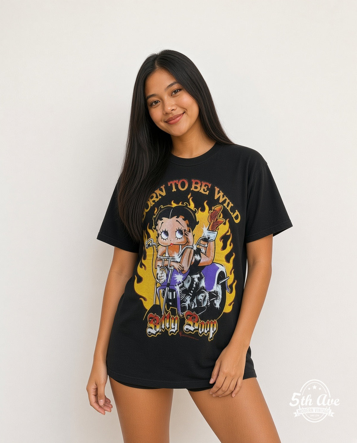 Model wearing the Betty Boop Born to Be Wild Biker graphic tee