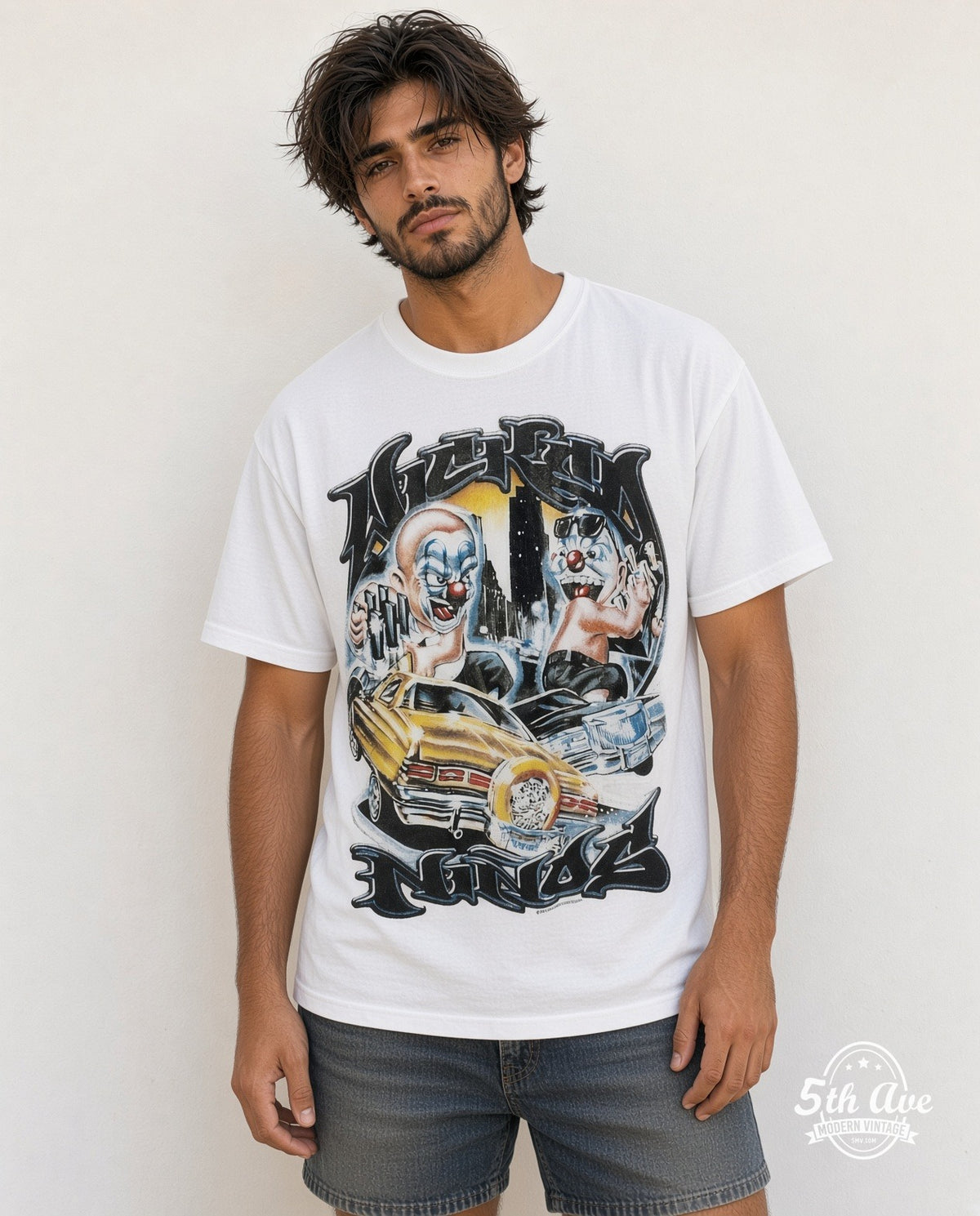Model wearing the Rollin Hard Lowrider Clowns Unleashed graphic tee