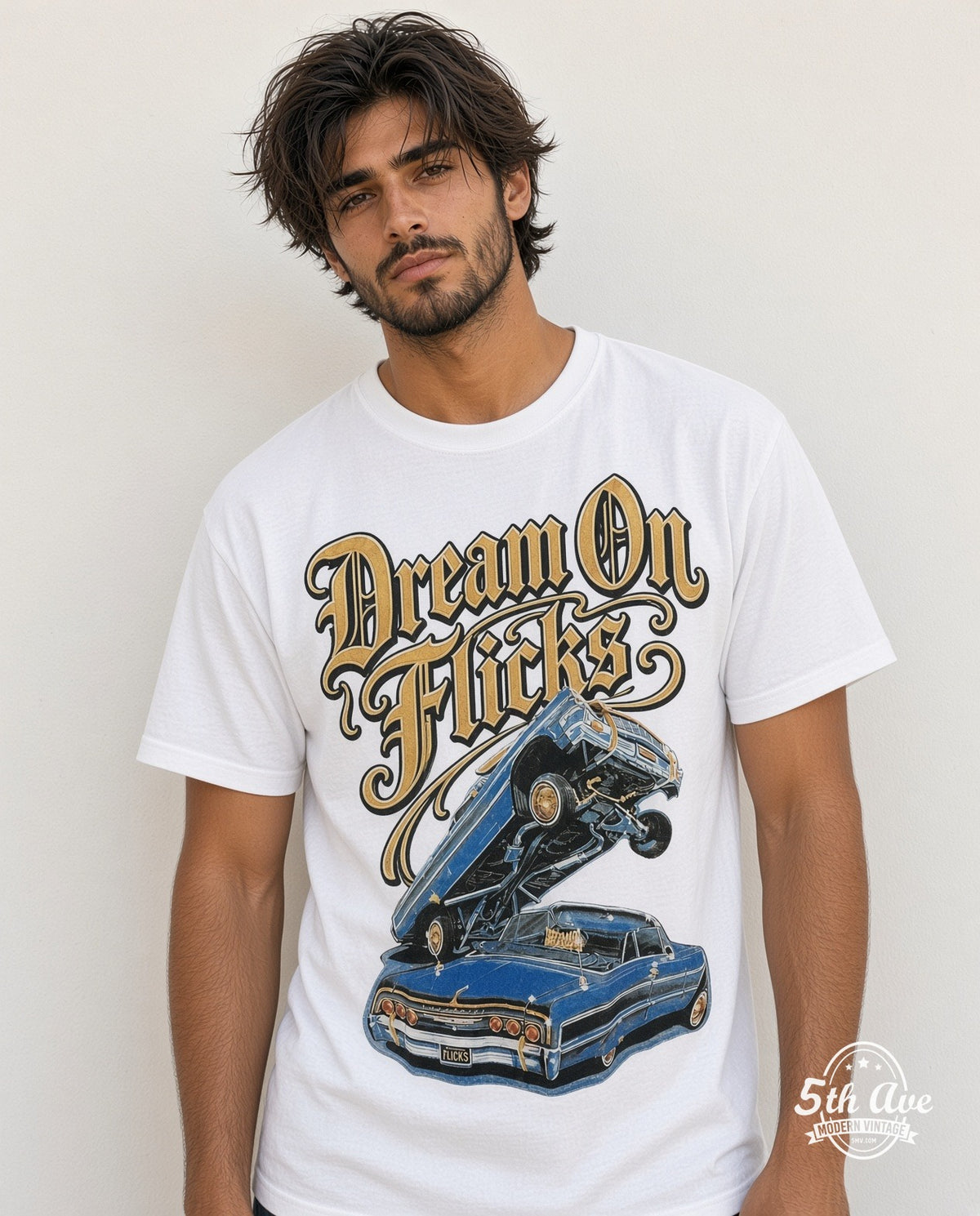 Model wearing the Rollin Hard White-on-White Lowrider Dreams graphic tee in white