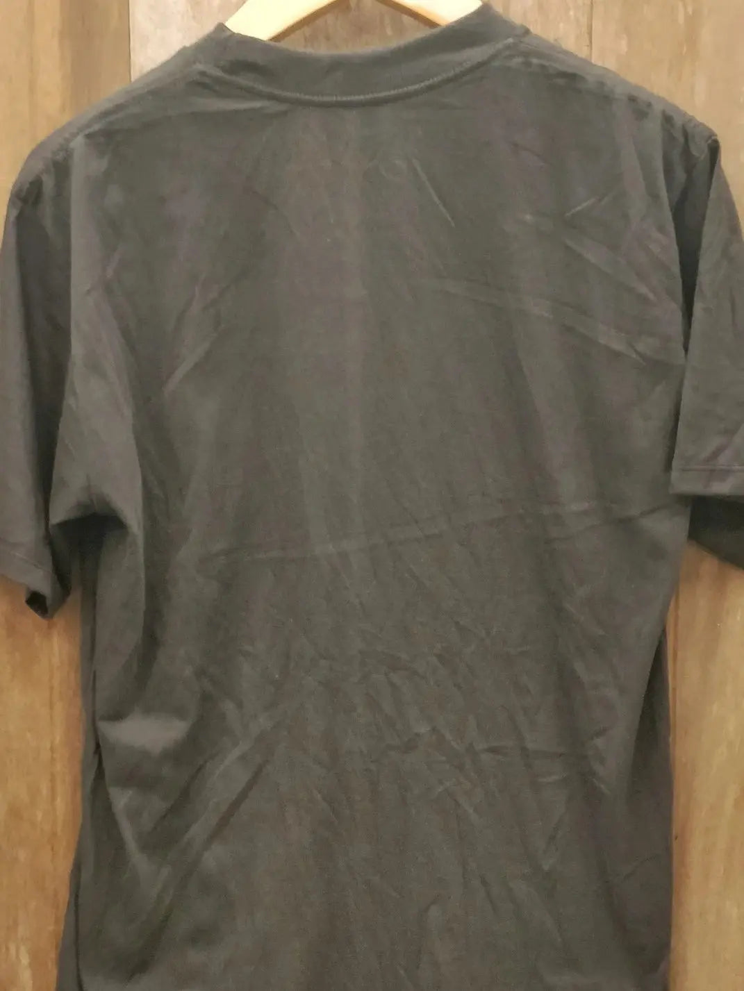 The Smiths – The Queen Is Dead Salford Lads Club vintage t-shirt laid on bed