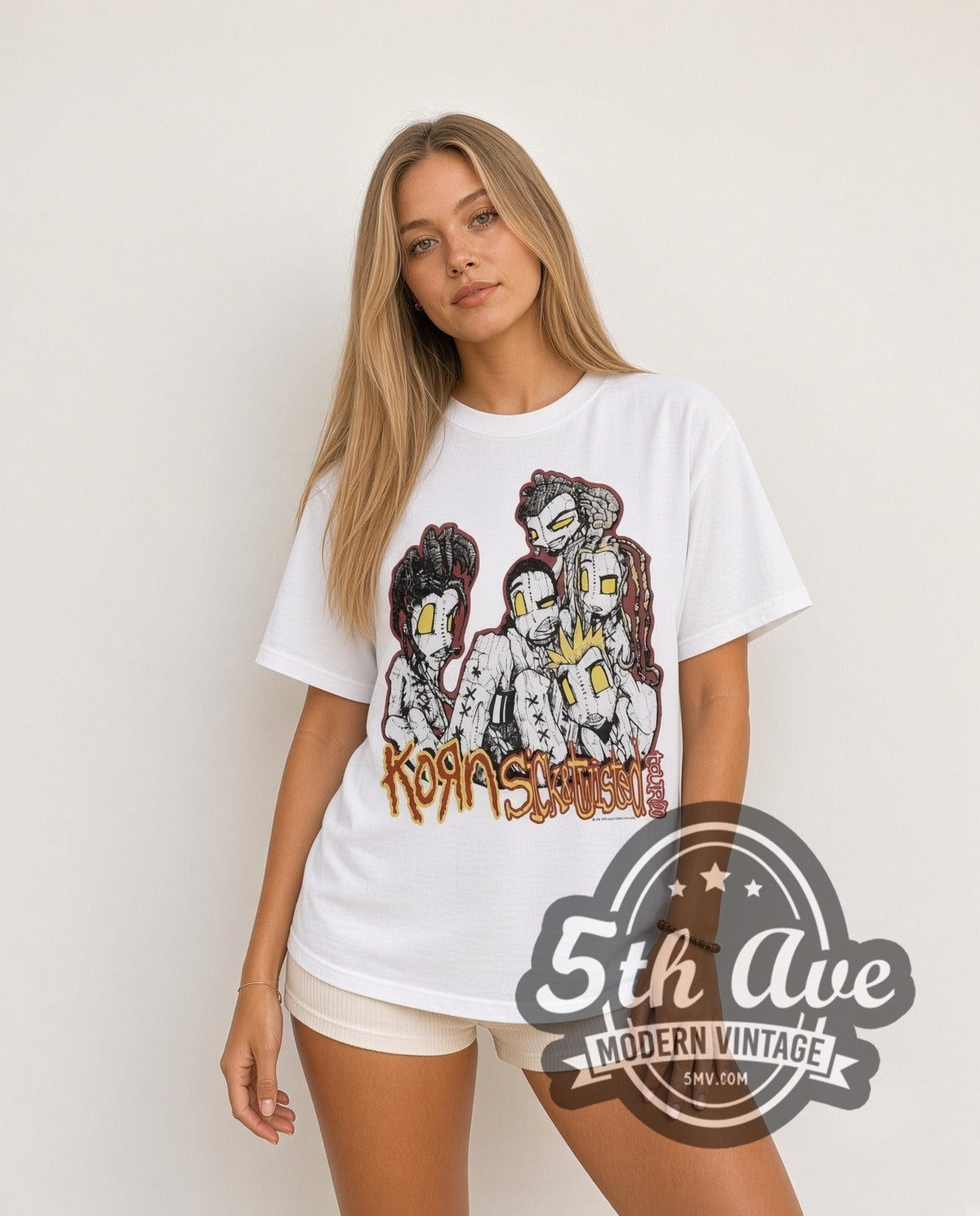 Model wearing the Korn Sick and Twisted Tour vintage band t-shirt in white