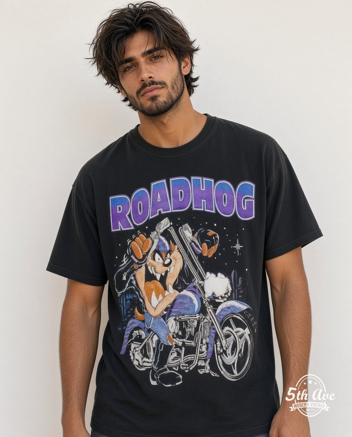 Model wearing the Looney Tunes / Harley-Davidson Roadhog graphic tee in black