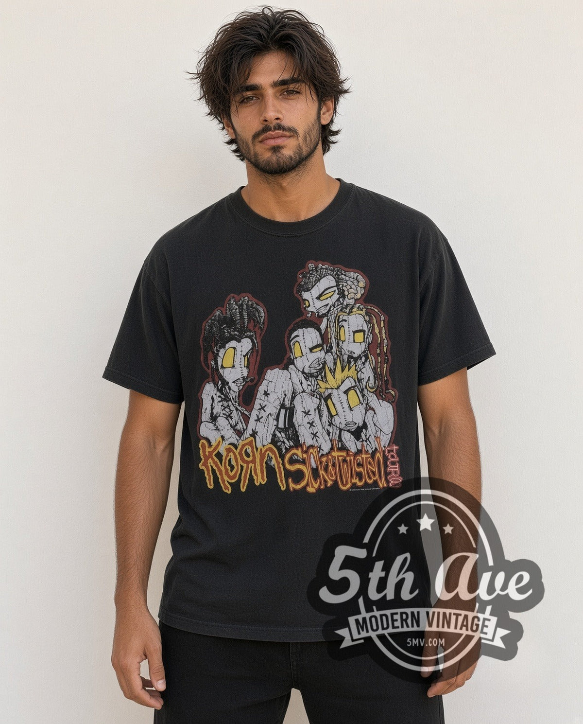 Model wearing the Korn Sick and Twisted Tour vintage band t-shirt in black