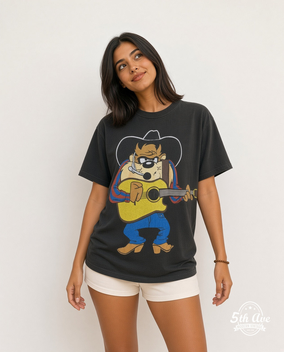 Model wearing the Looney Tunes Taz-Mania all-over-print graphic tee