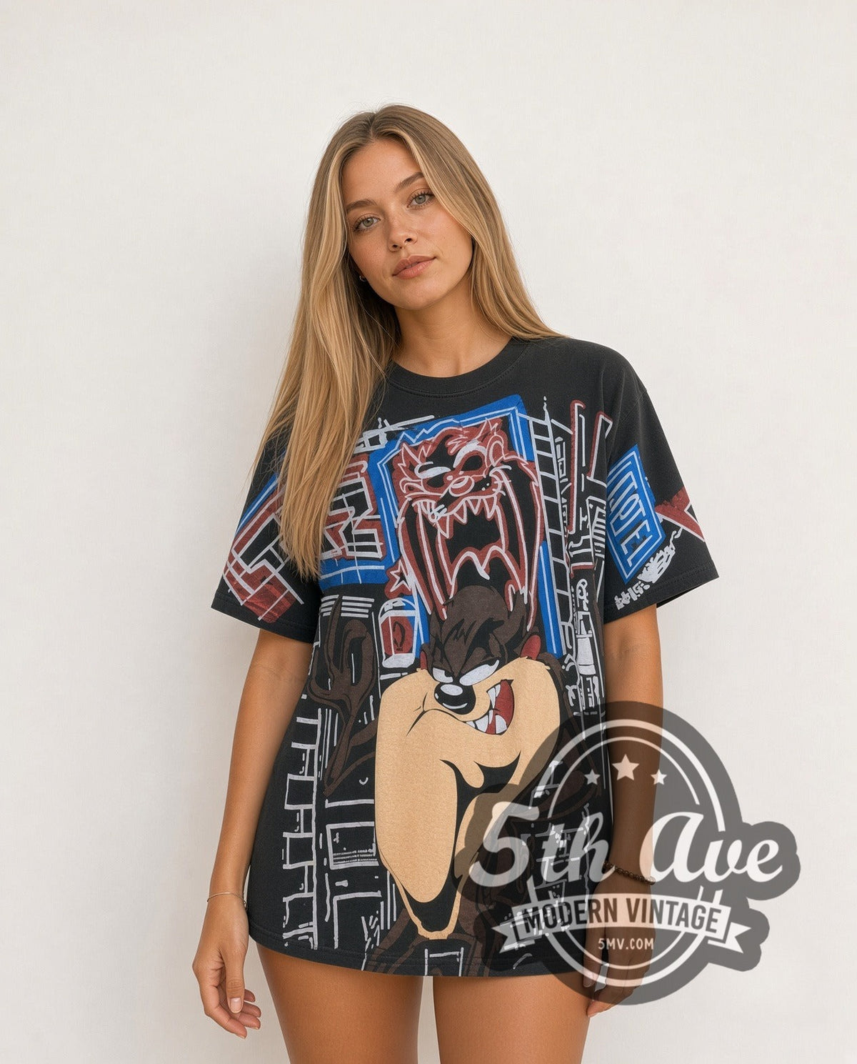 Model wearing the Looney Tunes Taz-Mania Limited Edition all-over-print vintage cartoon tee