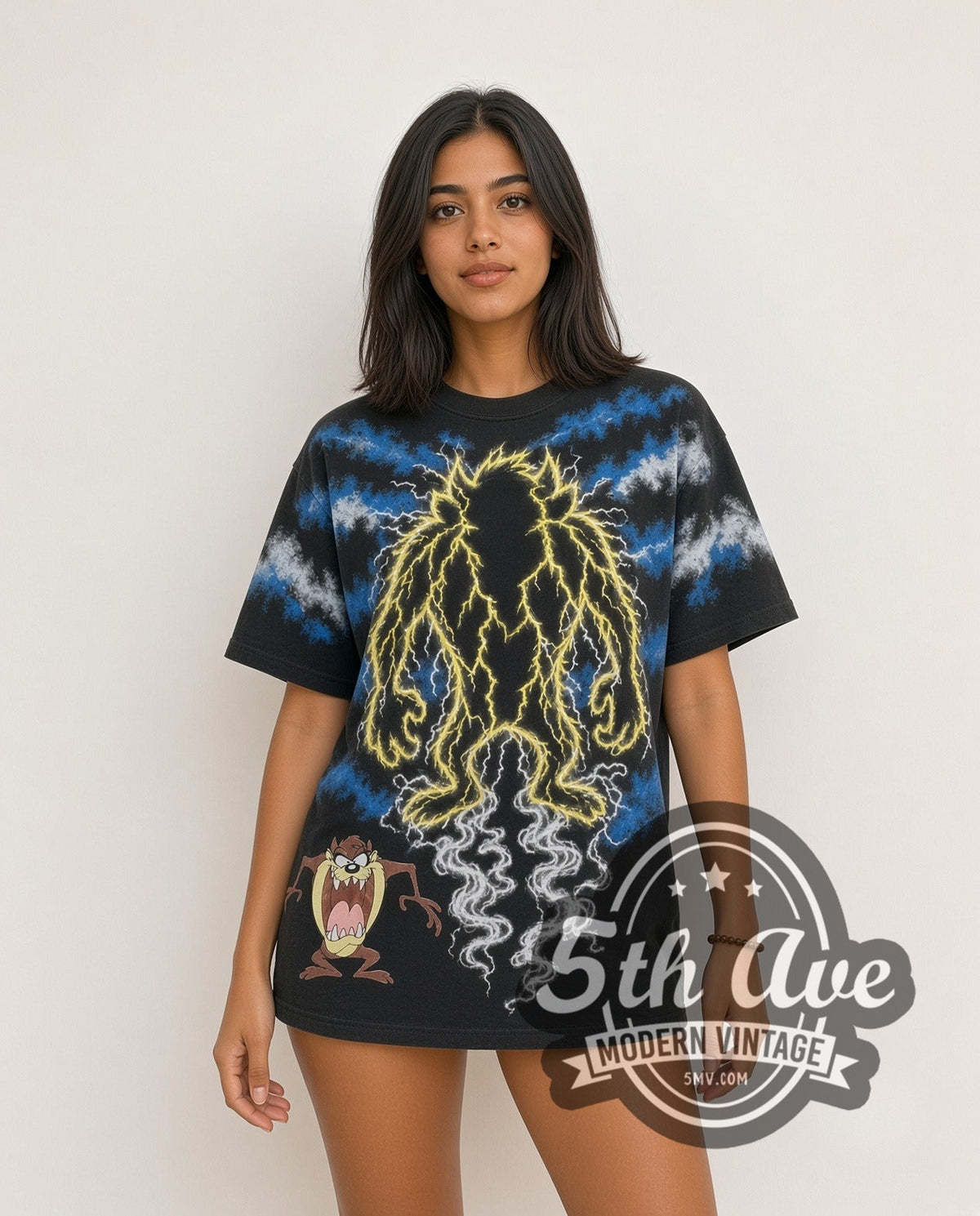 Model wearing the Looney Tunes Taz-Mania Iconic Design all-over-print vintage cartoon tee