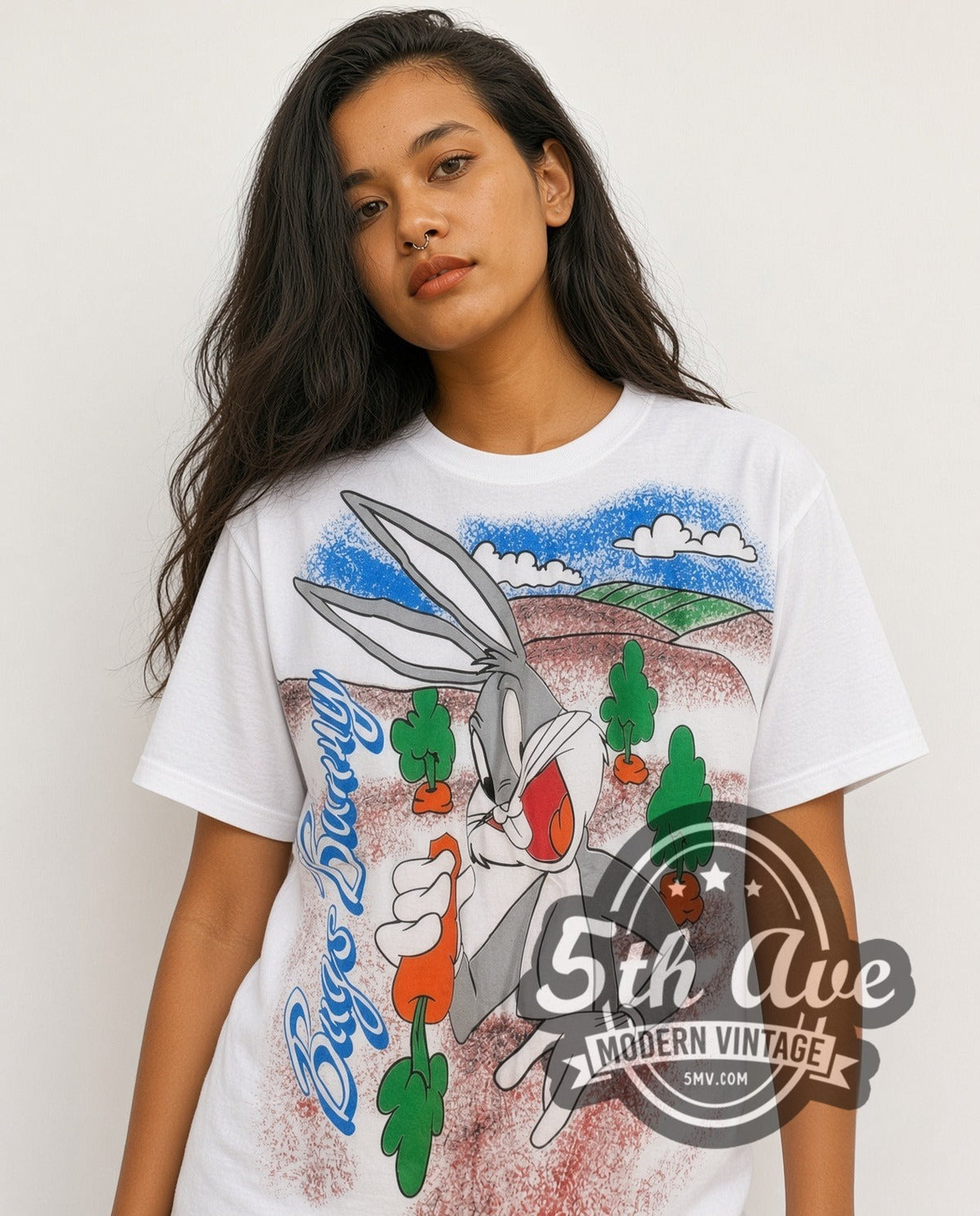 Model wearing the Bugs Bunny Carrot Patch all-over-print vintage cartoon tee in white