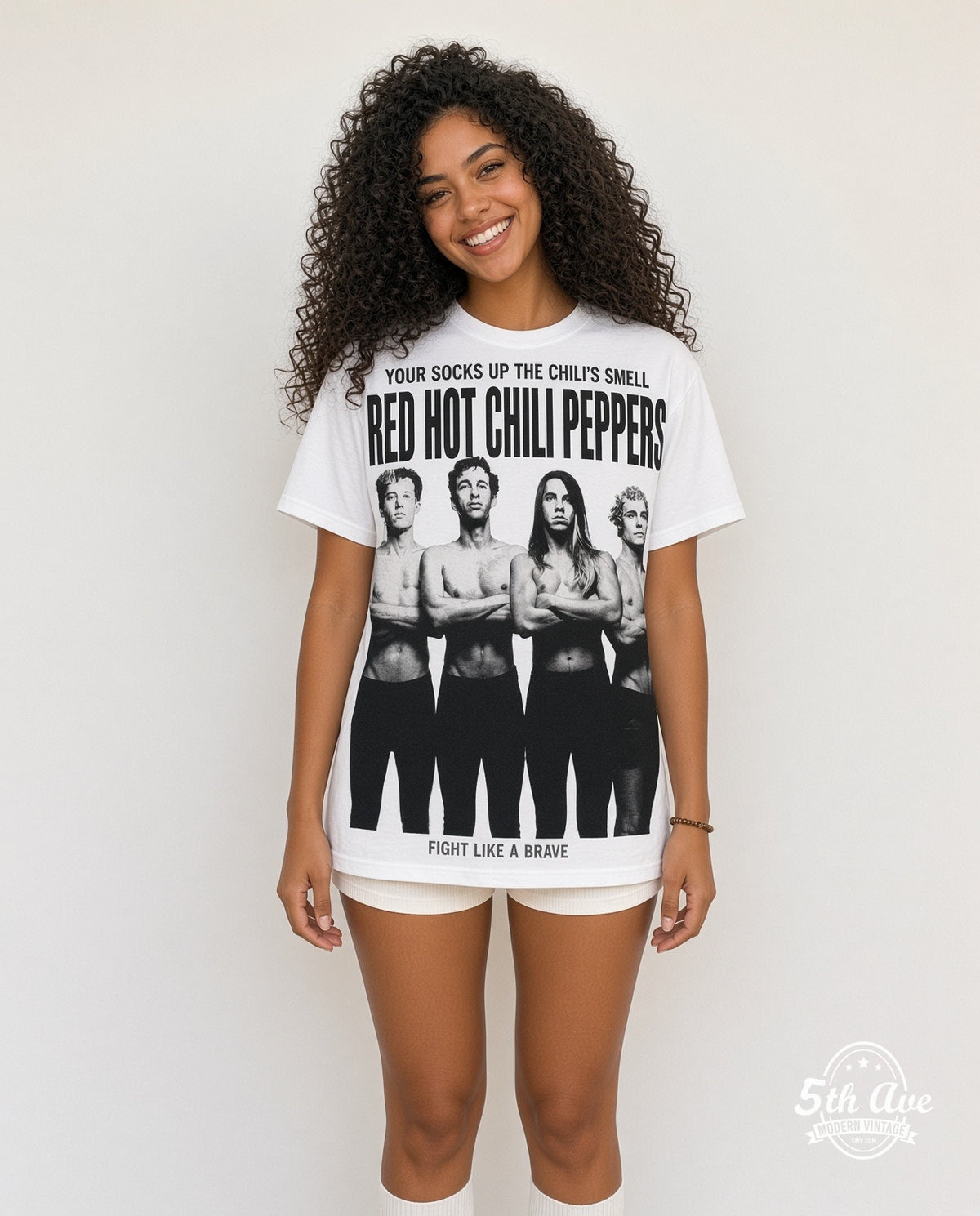 Model wearing the Red Hot Chili Peppers Fight Like a Brave all-over-print vintage band t-shirt