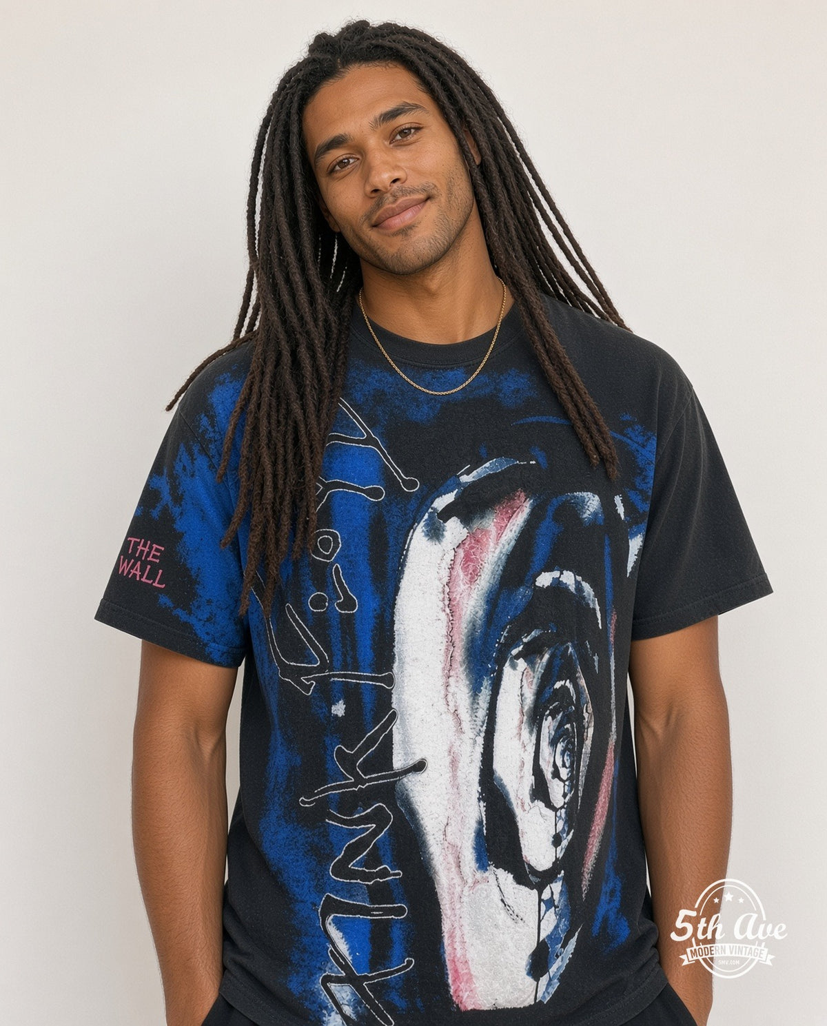 Model wearing the Pink Floyd The Wall all-over-print vintage band t-shirt