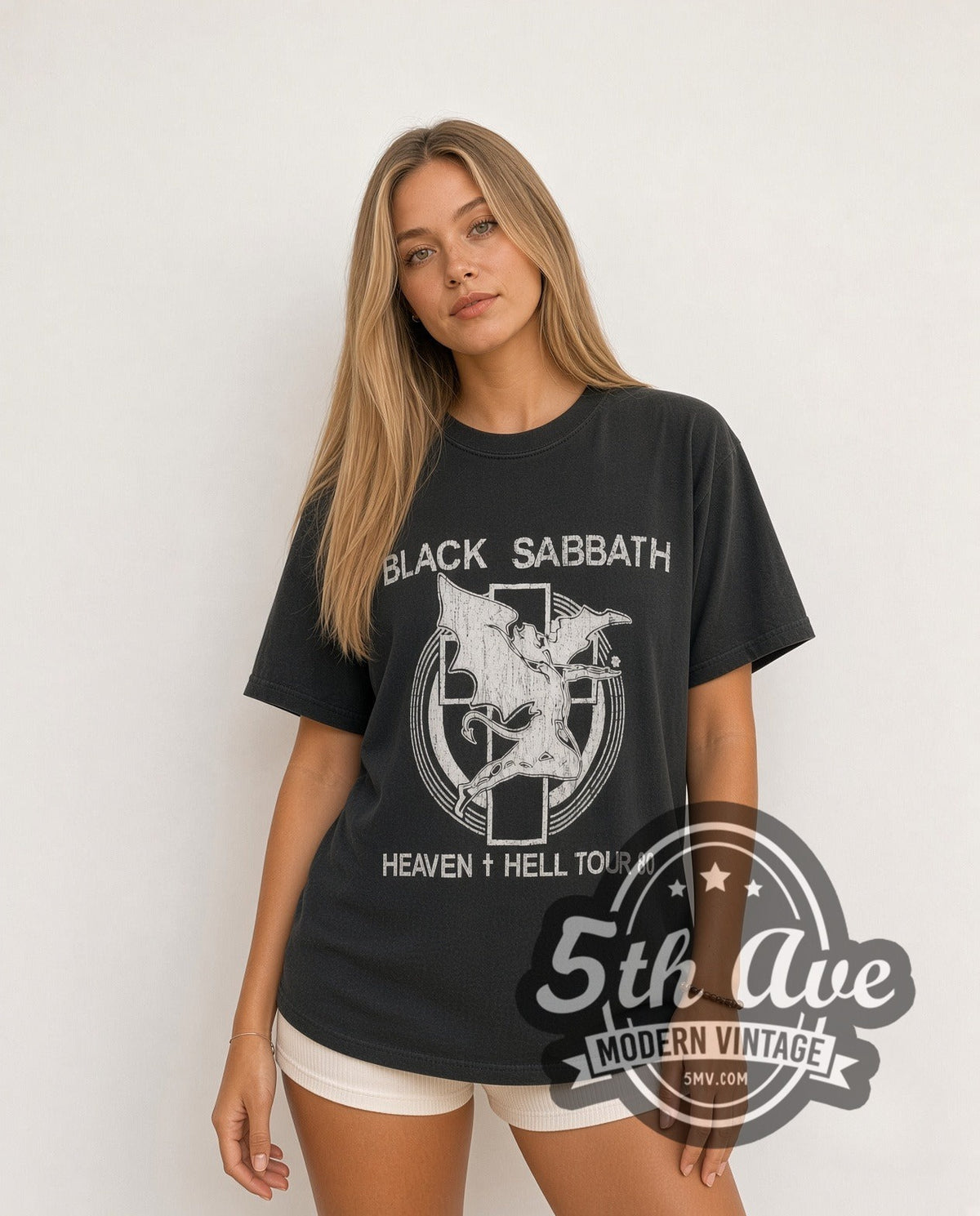 Model wearing the Black Sabbath Heaven & Hell Resonance vintage band t-shirt