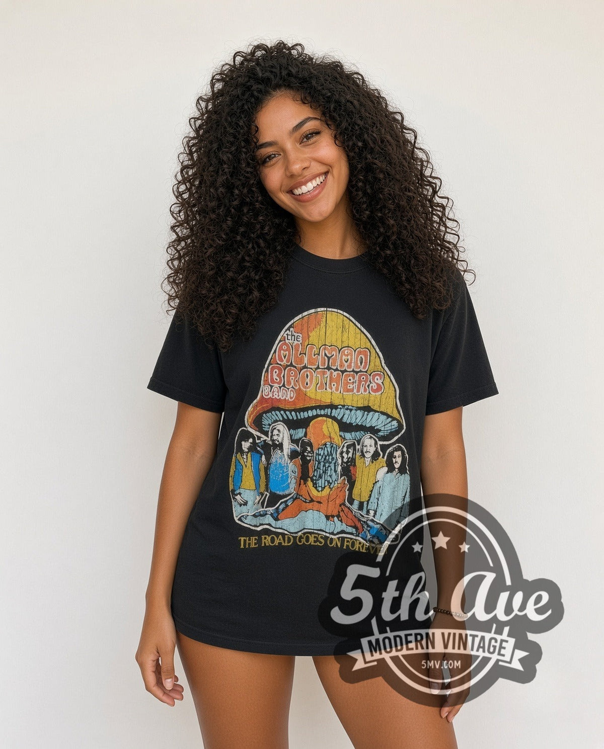 Model wearing The Allman Brothers Band The Road Goes On Forever vintage band t-shirt
