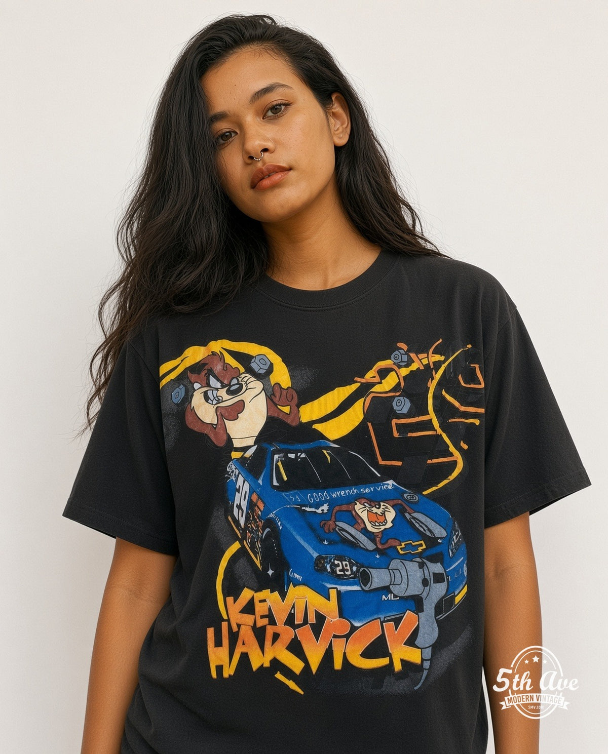 Model wearing the NASCAR Kevin Harvick #29 Taz Looney Tunes all-over-print NASCAR t-shirt in black
