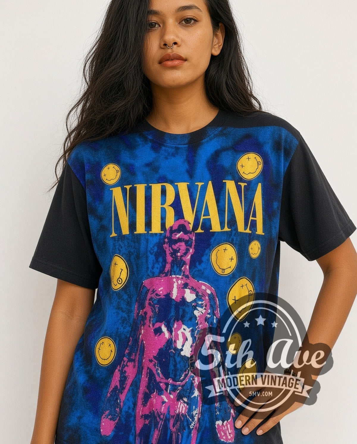 Model wearing the Nirvana all-over-print vintage band t-shirt