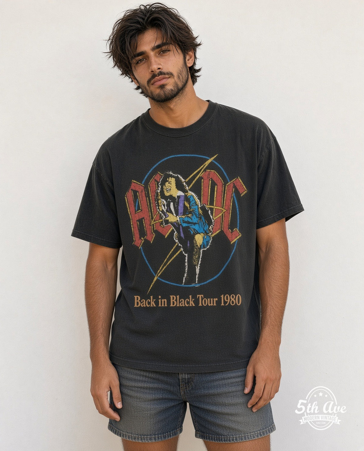 Model wearing the AC/DC Back in Black Tour 1980 vintage band t-shirt in black
