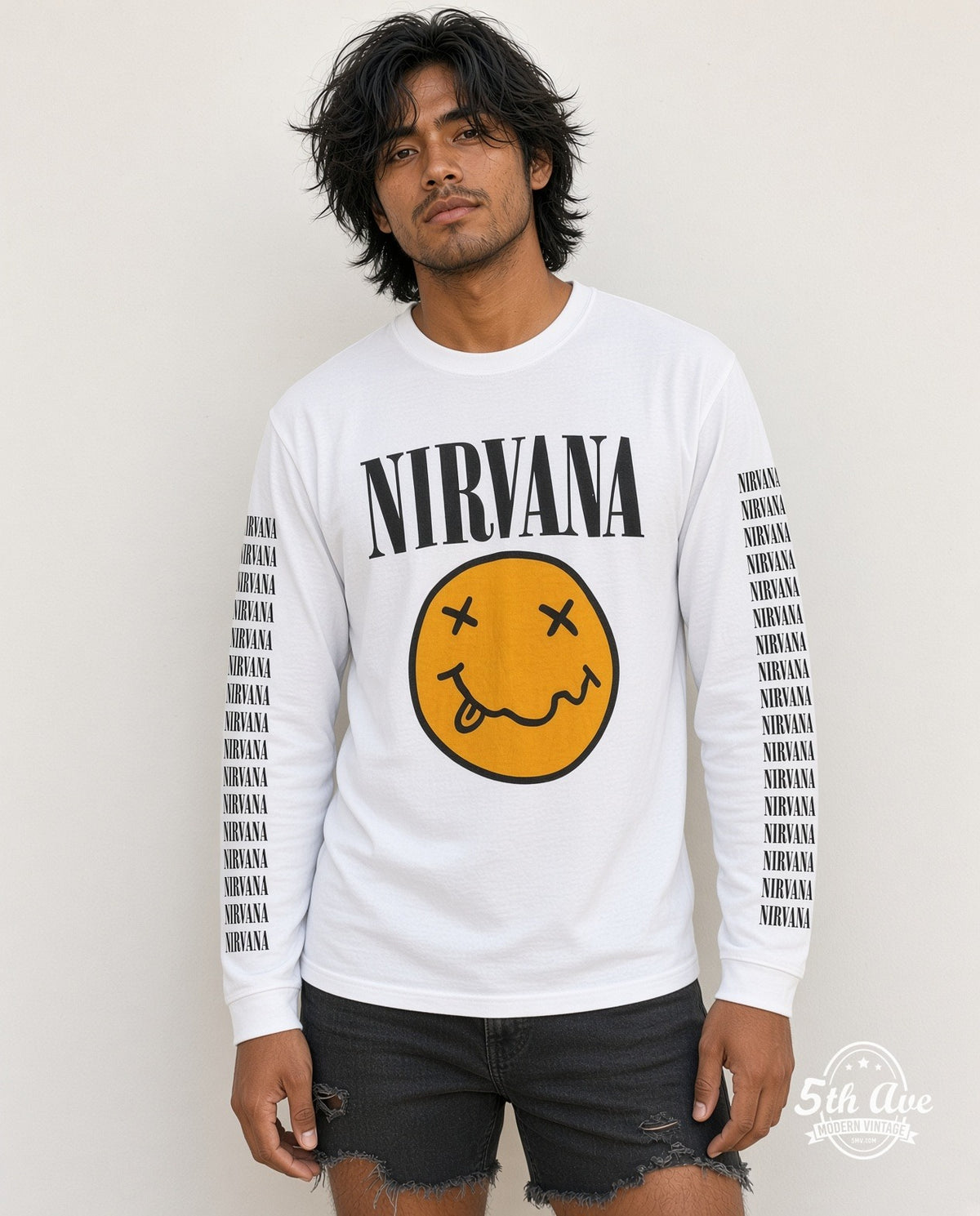 Model wearing the Nirvana Smiley Face In Utero Tour long sleeve vintage band t-shirt in white