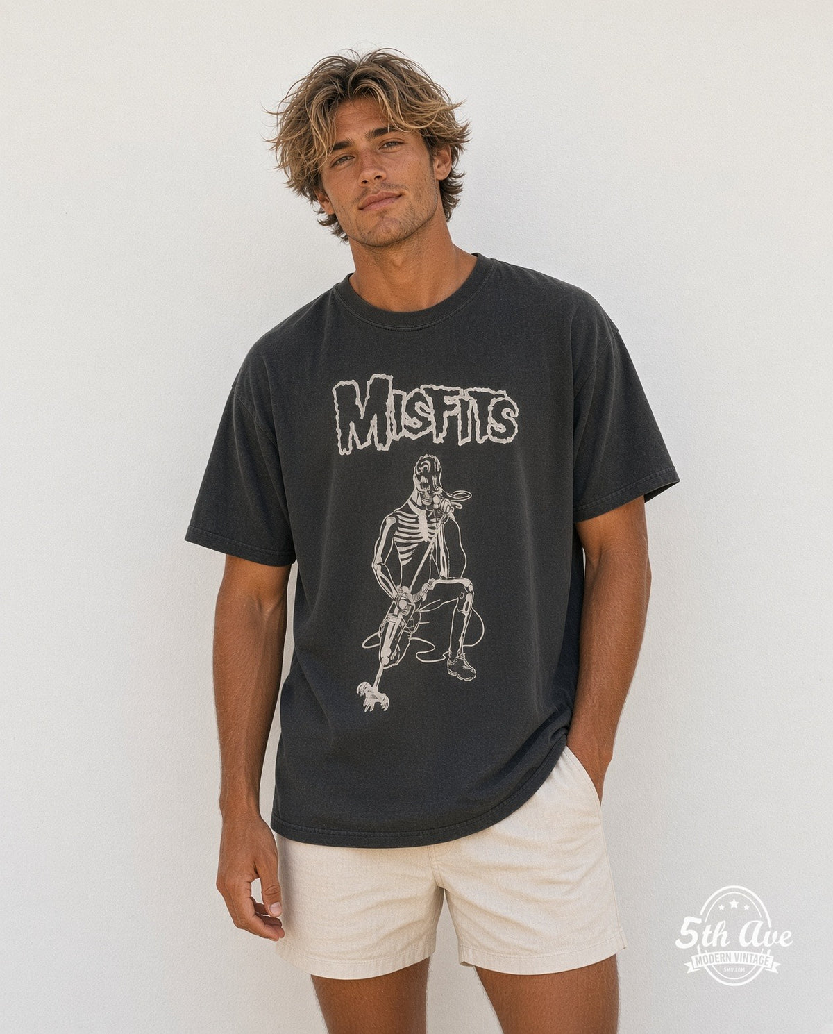 Model wearing the Misfits Kneeling Fiend with Microphone vintage band t-shirt