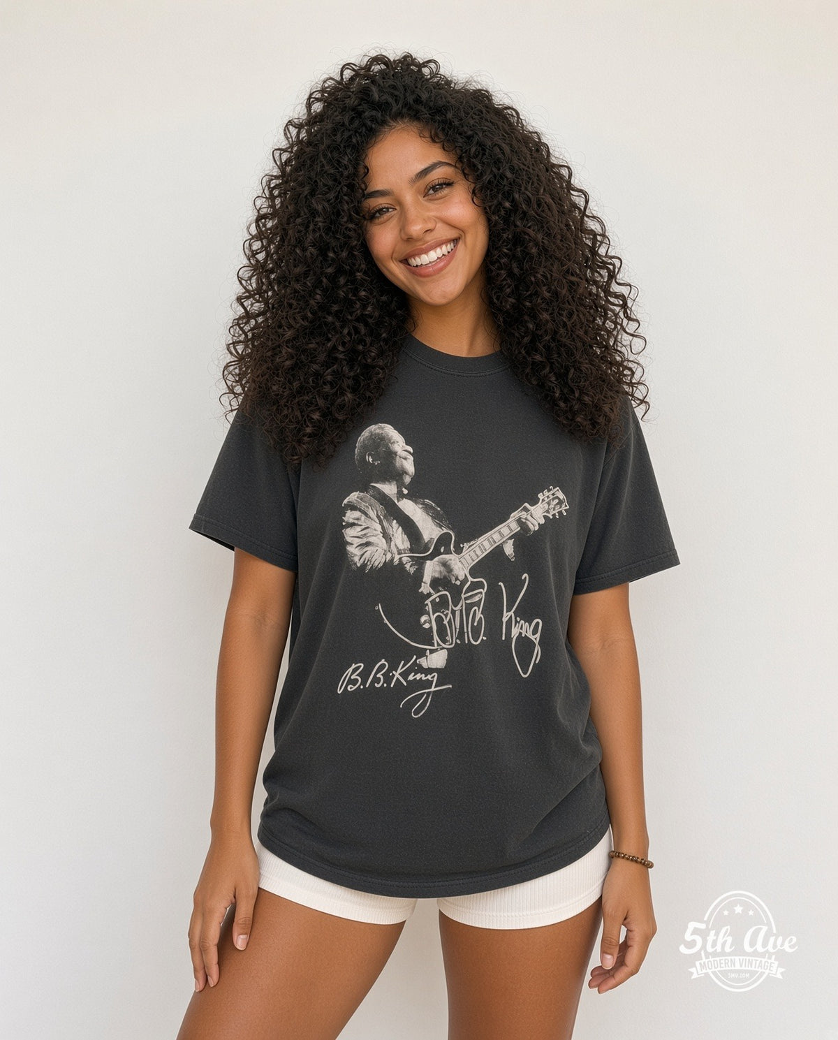 Model wearing the B.B. King Guitar Signature Portrait vintage band t-shirt