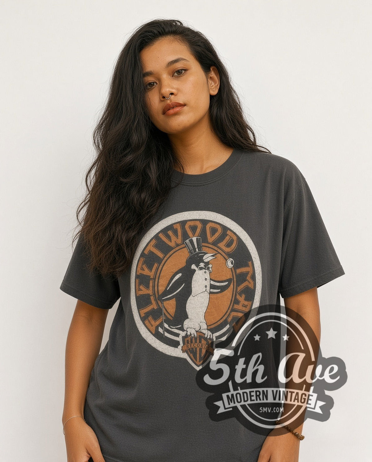 Model wearing the Fleetwood Mac Penguin Logo vintage band t-shirt
