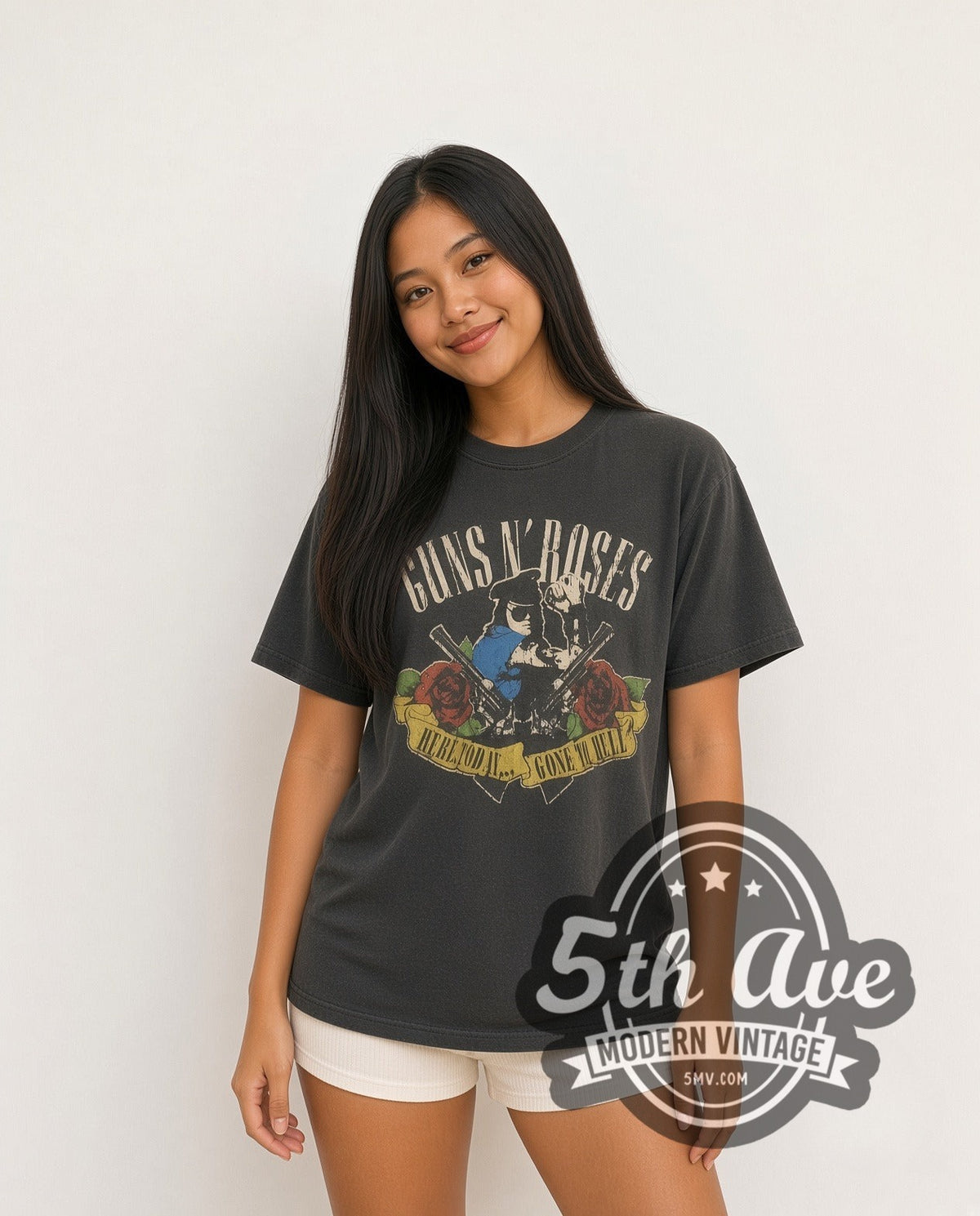 Model wearing the Guns N' Roses Skull and Roses Banner vintage band t-shirt