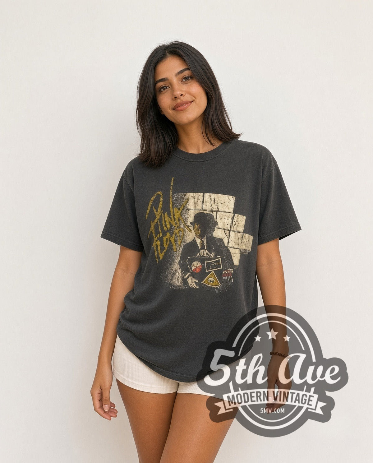 Model wearing the Pink Floyd Wall and Derby Figure vintage band t-shirt