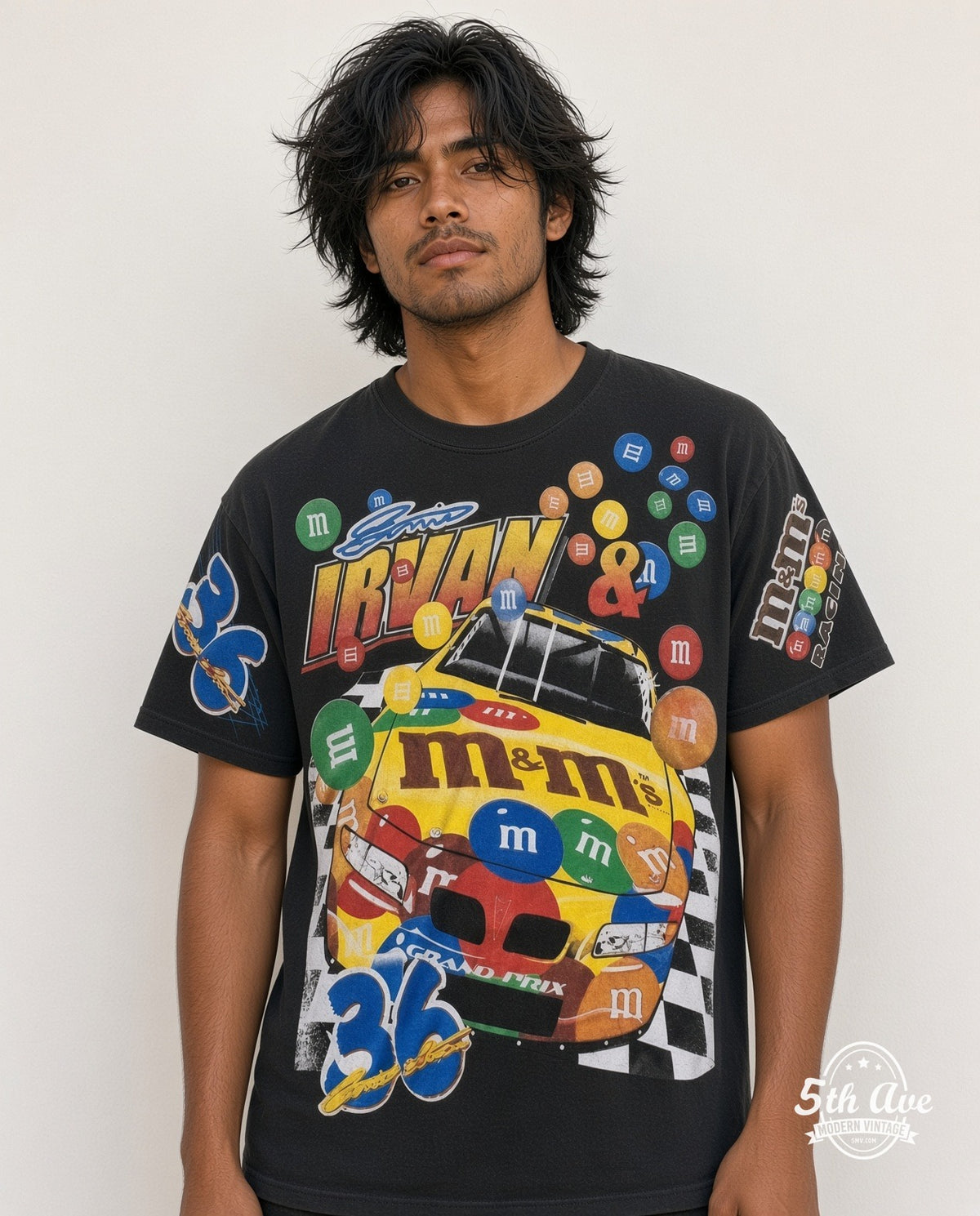 Model wearing the NASCAR Ernie Irvan #36 M&M's Racing all-over-print NASCAR t-shirt in black