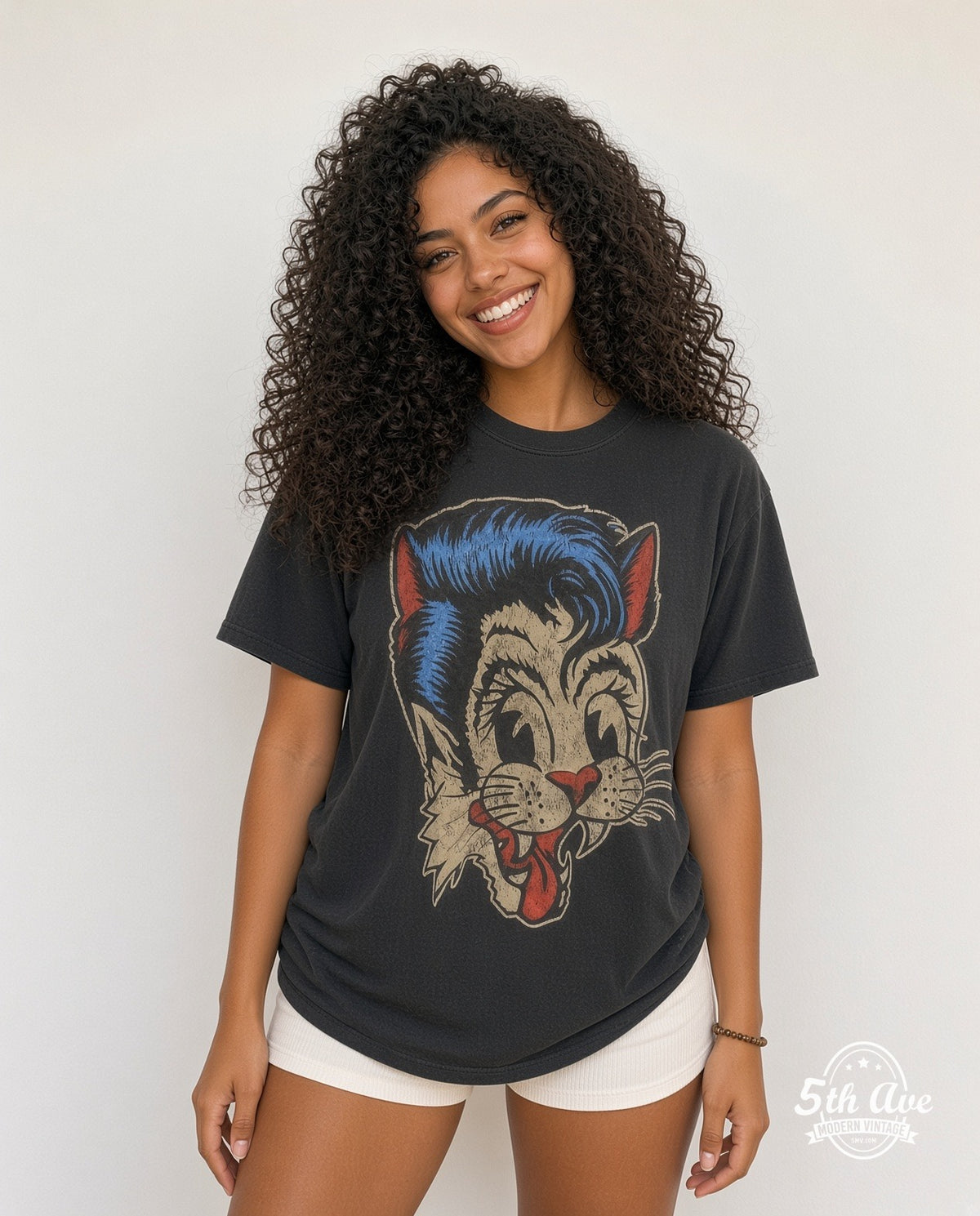Model wearing the Stray Cats Blue Pompadour Cat Logo vintage band t-shirt