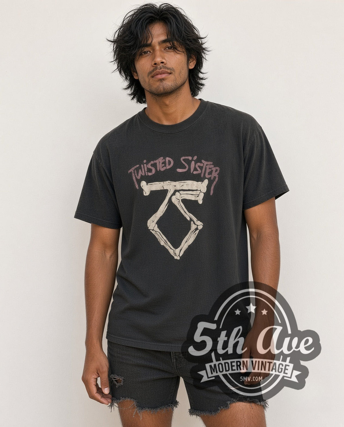Model wearing the Twisted Sister Bone TS Logo Pink Band Name vintage band t-shirt