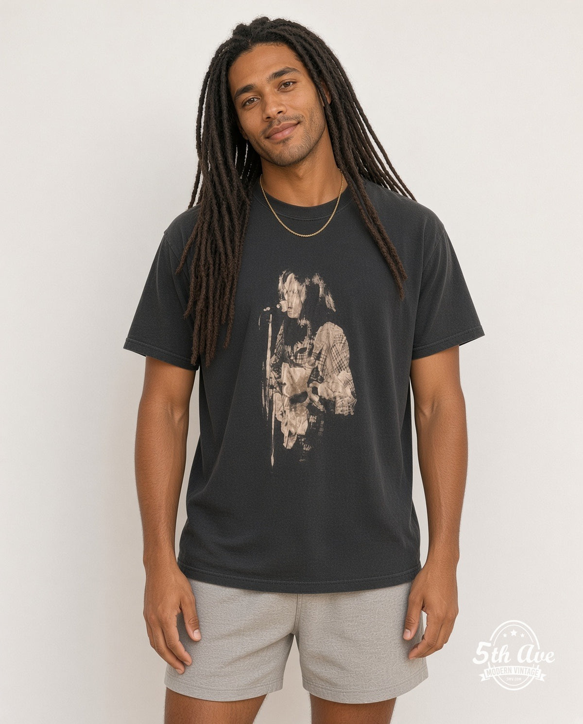 Model wearing the Neil Young Black-and-White Performance with Captain Boot Tag vintage band t-shirt