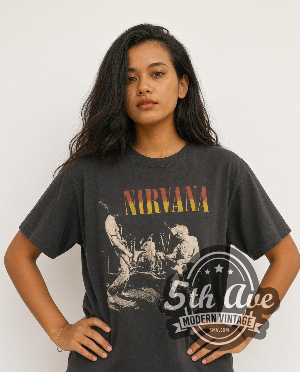 Model wearing the Nirvana Live Stage Photo Red-Yellow Logo vintage band t-shirt