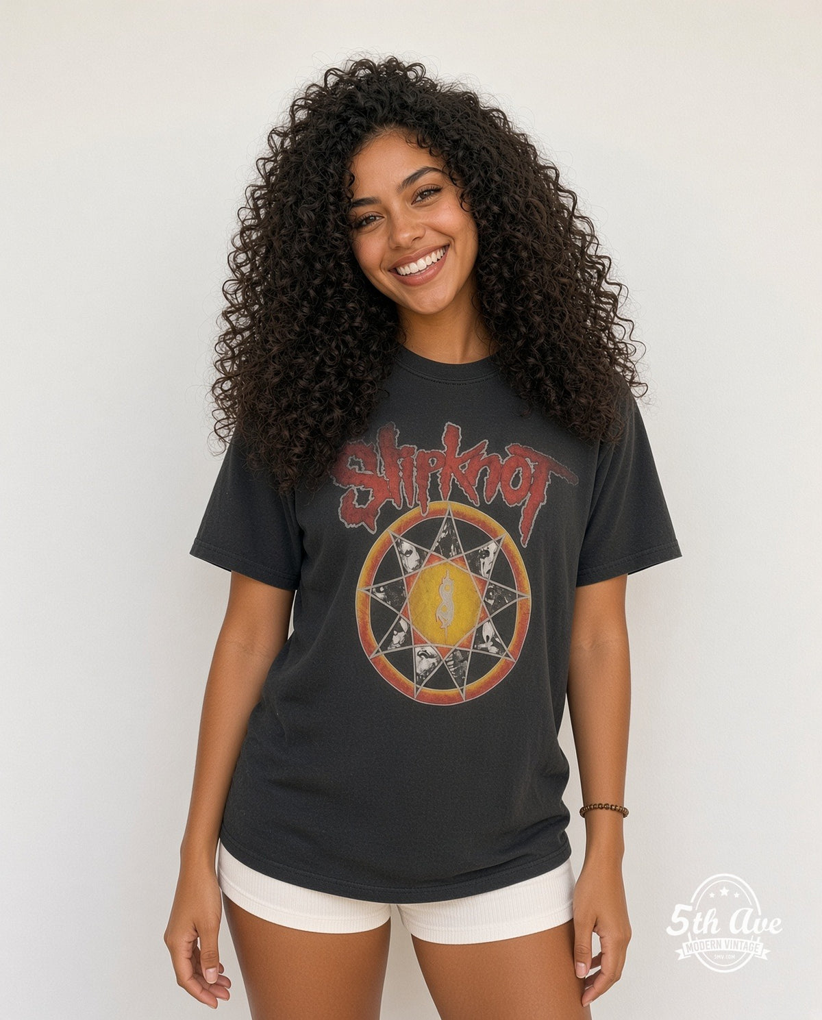 Model wearing the Slipknot Nonagram Tribal S Member Portraits vintage band t-shirt