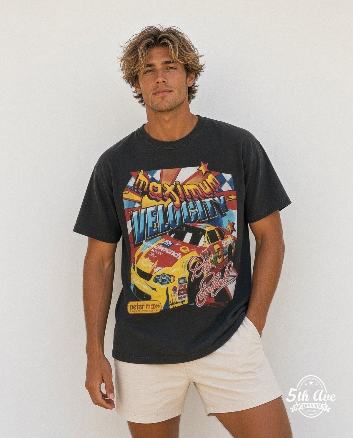 Model wearing the NASCAR Dale Earnhardt #3 Maximum Velocity Peter Max all-over-print NASCAR t-shirt in black