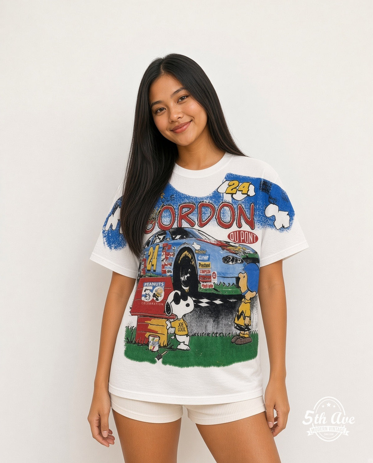 Model wearing the NASCAR Jeff Gordon #24 Good Ol Gordon Peanuts Snoopy all-over-print NASCAR t-shirt in white