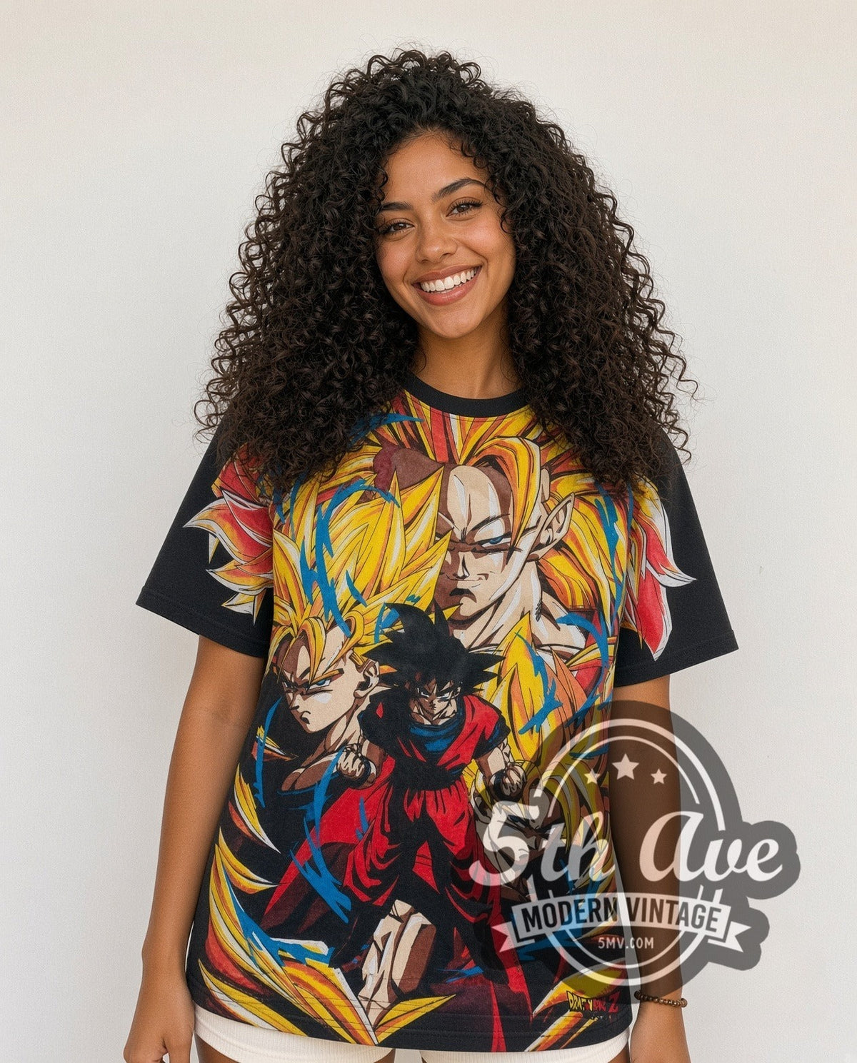 Model wearing the Dragon Ball Z Goku Super Saiyan Forms all-over-print vintage cartoon t-shirt in black