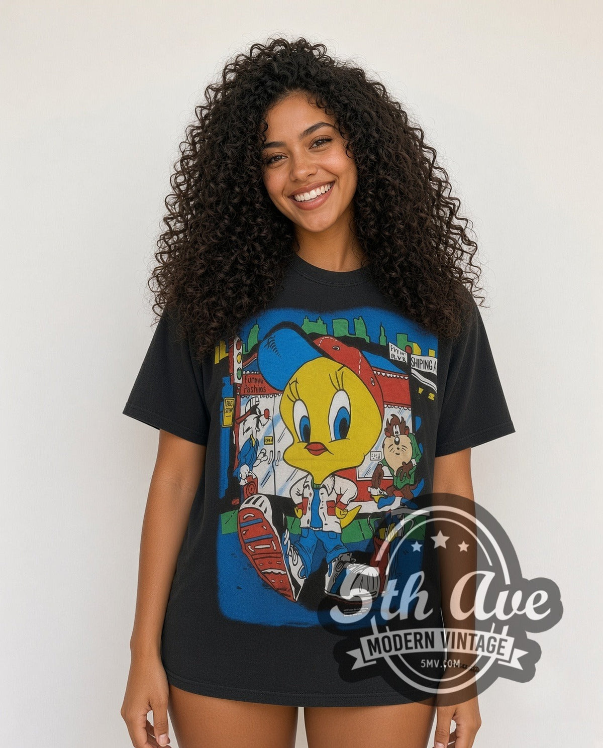Model wearing the Looney Tunes Tweety Streetwear City all-over-print vintage cartoon t-shirt in black