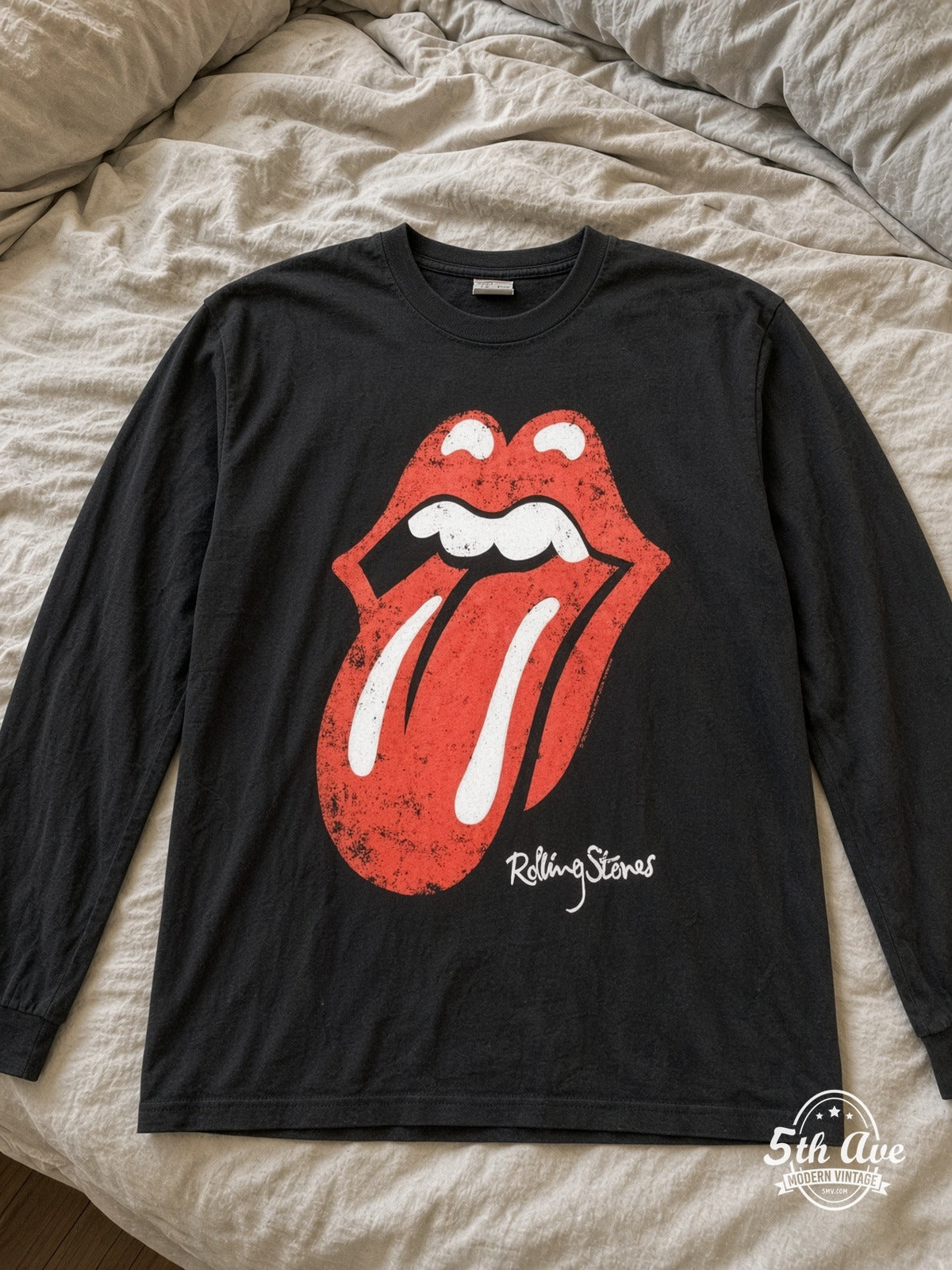 ETS LS 26 The Rolling Stones Tongue Logo long sleeve vintage tee laid on a bed