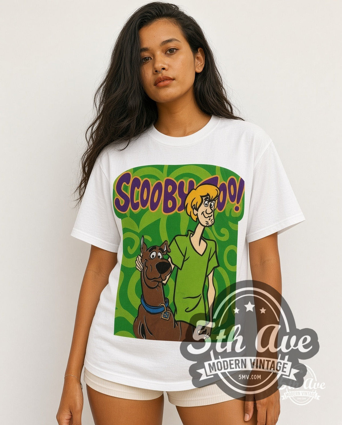 Model wearing the Scooby-Doo Scooby & Shaggy Green Swirl all-over-print vintage cartoon t-shirt in white