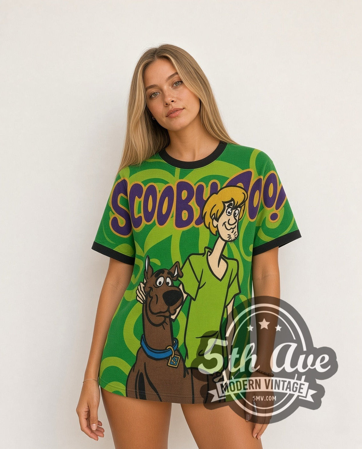 Model wearing the Scooby-Doo Scooby & Shaggy Green Swirl all-over-print vintage cartoon t-shirt in green
