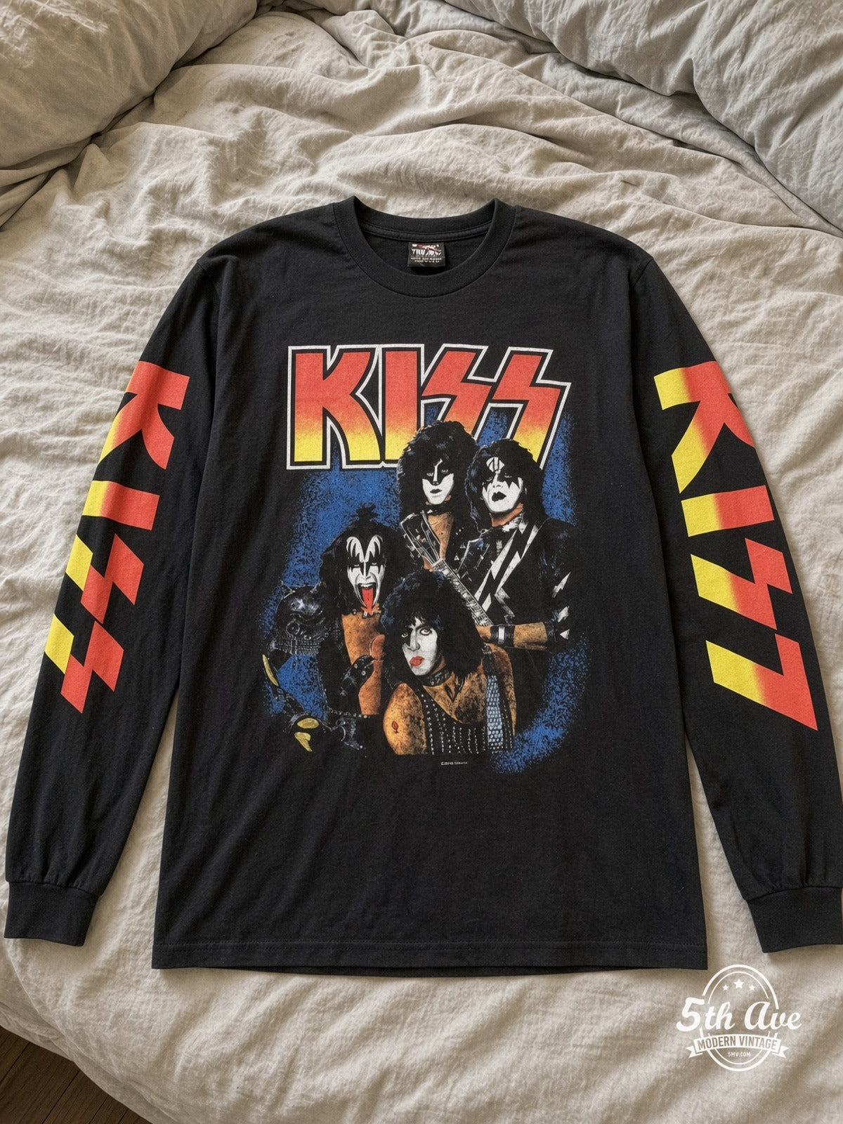 ETS LS 28 KISS Band Photo long sleeve vintage tee laid on a bed