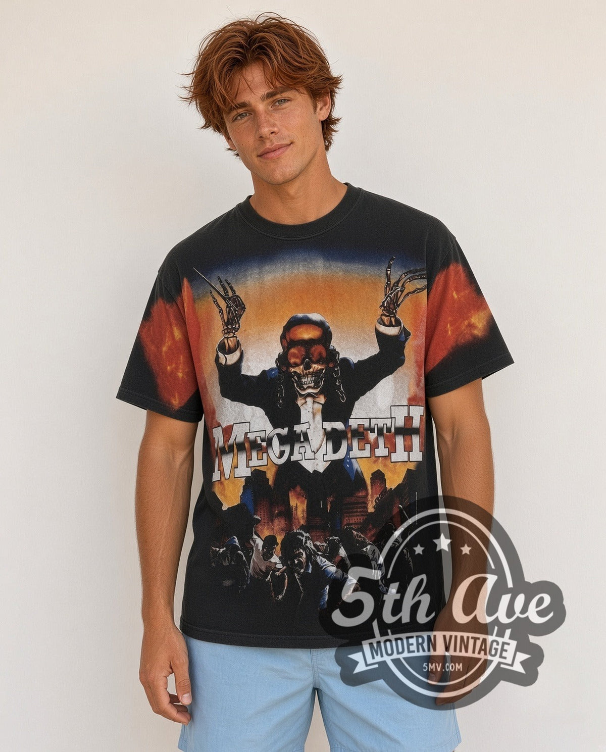 Model wearing the Megadeth Vic Flames Arms Raised all-over-print vintage band t-shirt in black