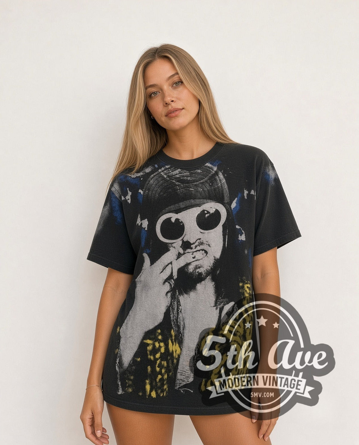 Model wearing the Kurt Cobain Sunglasses Leopard all-over-print vintage band tee in black