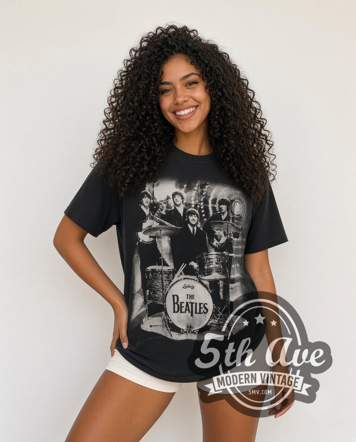 Model wearing The Beatles Live Abbey Drums all-over-print vintage band t-shirt