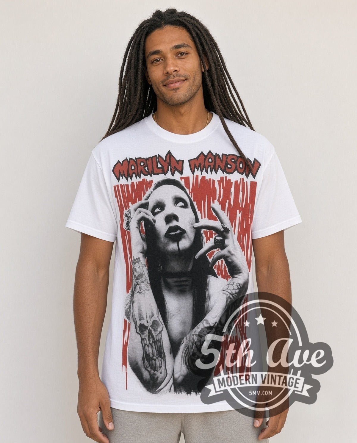 Model wearing the Marilyn Manson Face Closeup all-over-print vintage band t-shirt in white