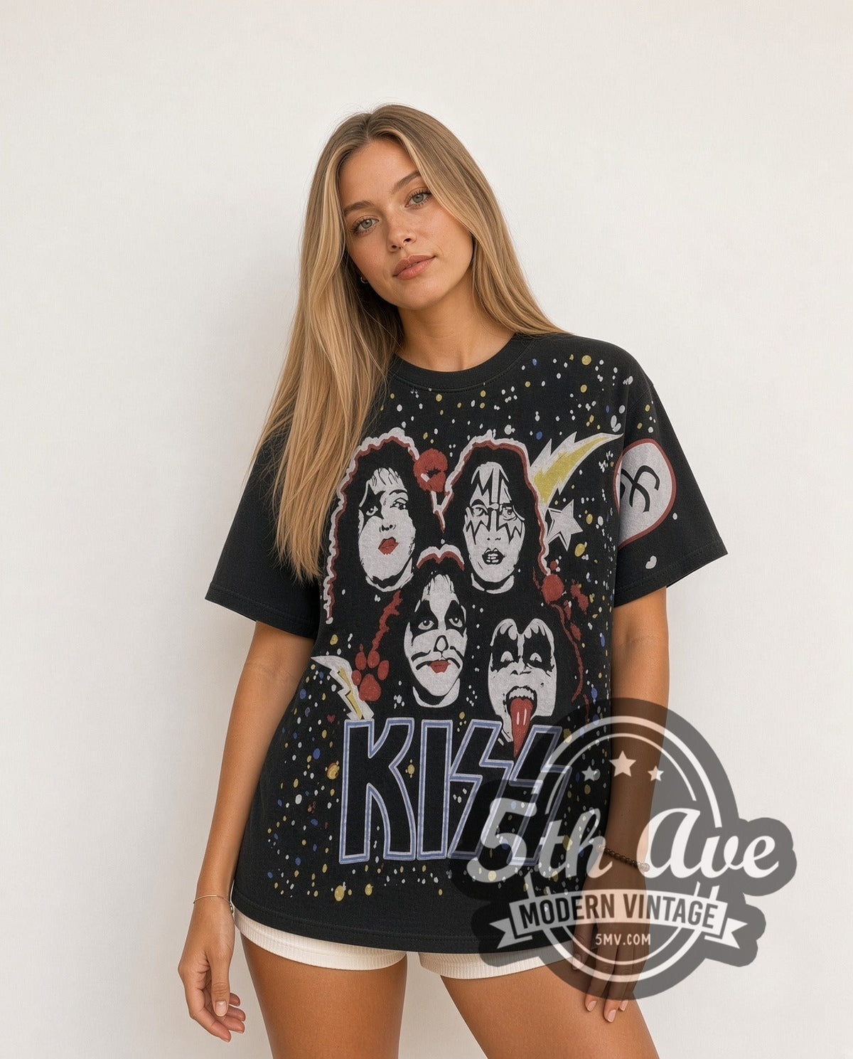 Model wearing the KISS Galaxy Faces all-over-print vintage band t-shirt in black