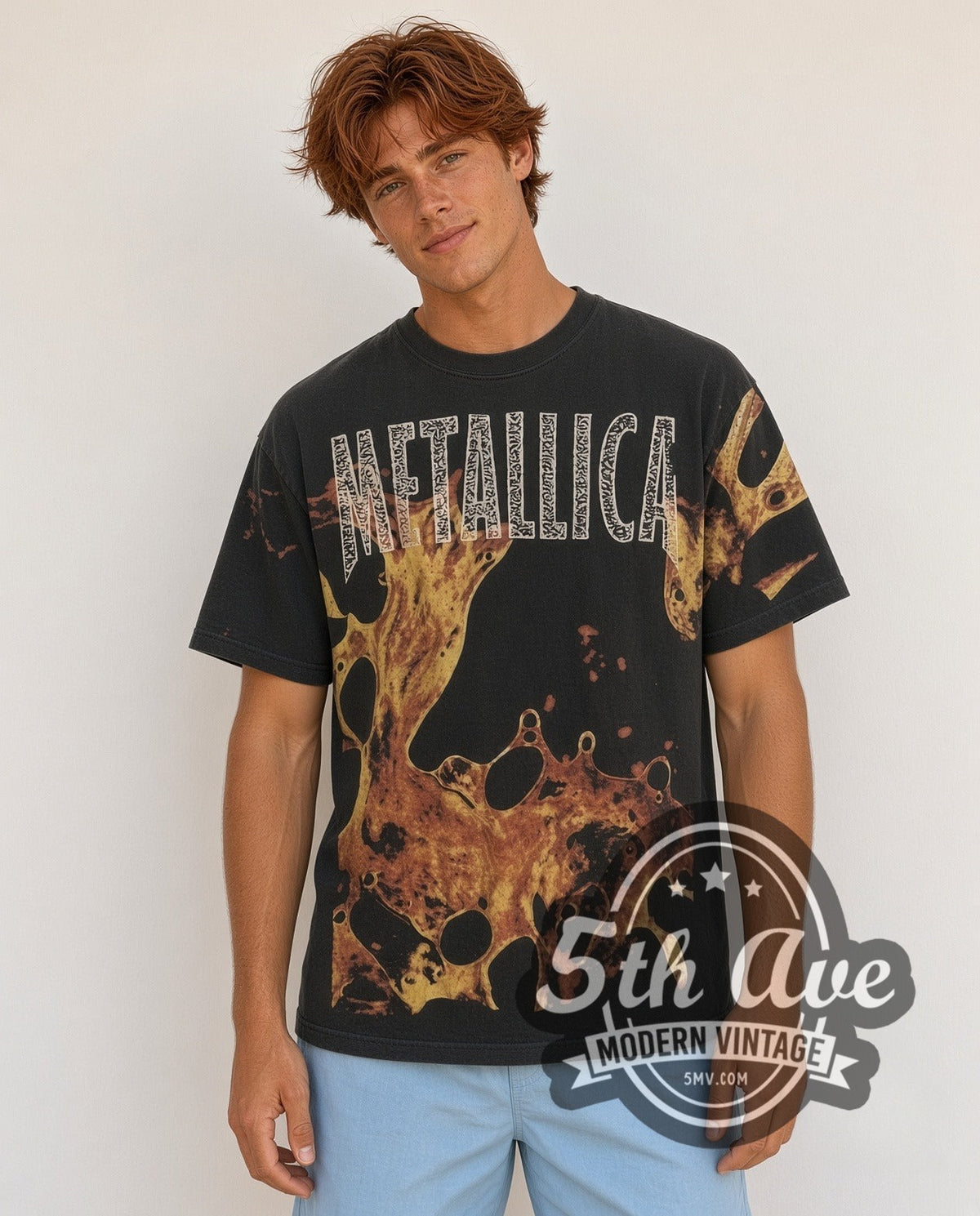 Model wearing the Metallica Liquid Fire all-over-print vintage band t-shirt in black