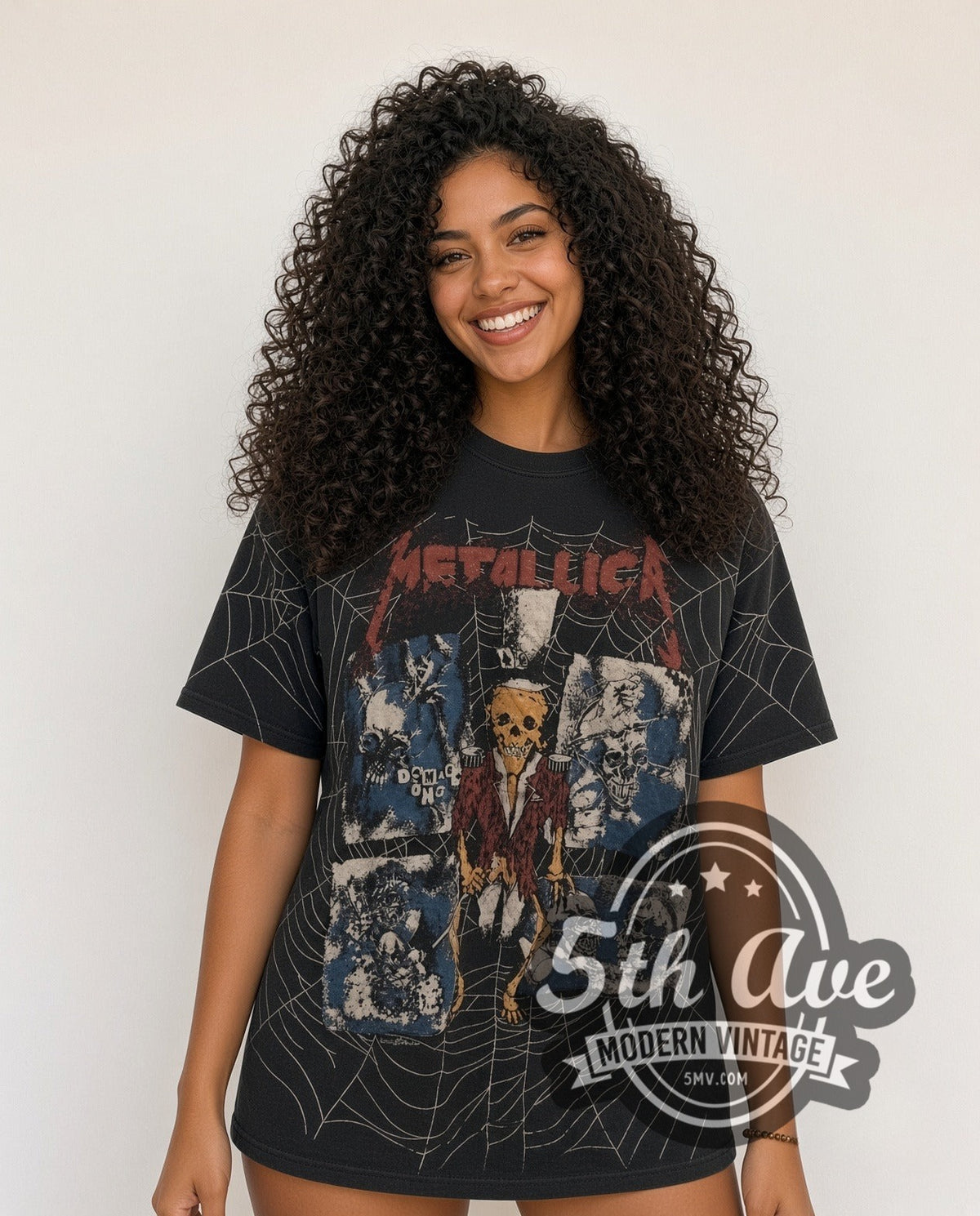 Model wearing the Metallica Skeleton Spiderweb all-over-print vintage band t-shirt in black