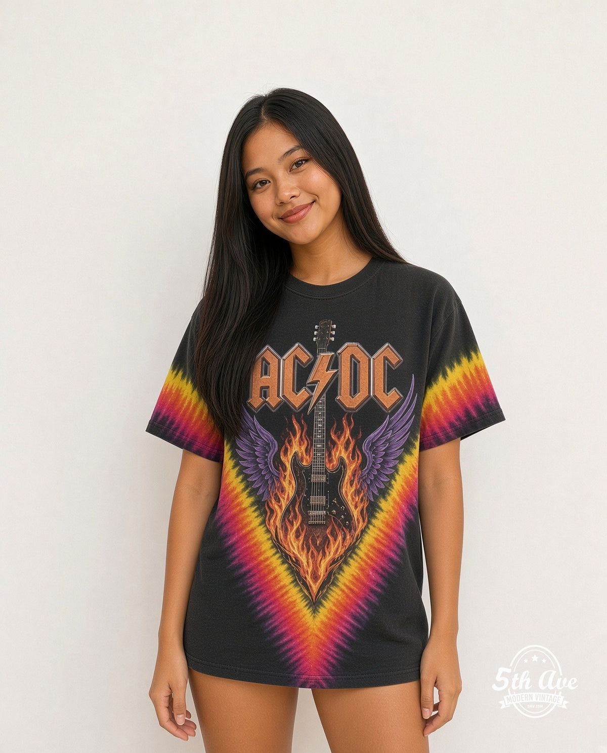 Model wearing AC/DC Flaming Winged Guitar Tie-Dye V vintage band tee