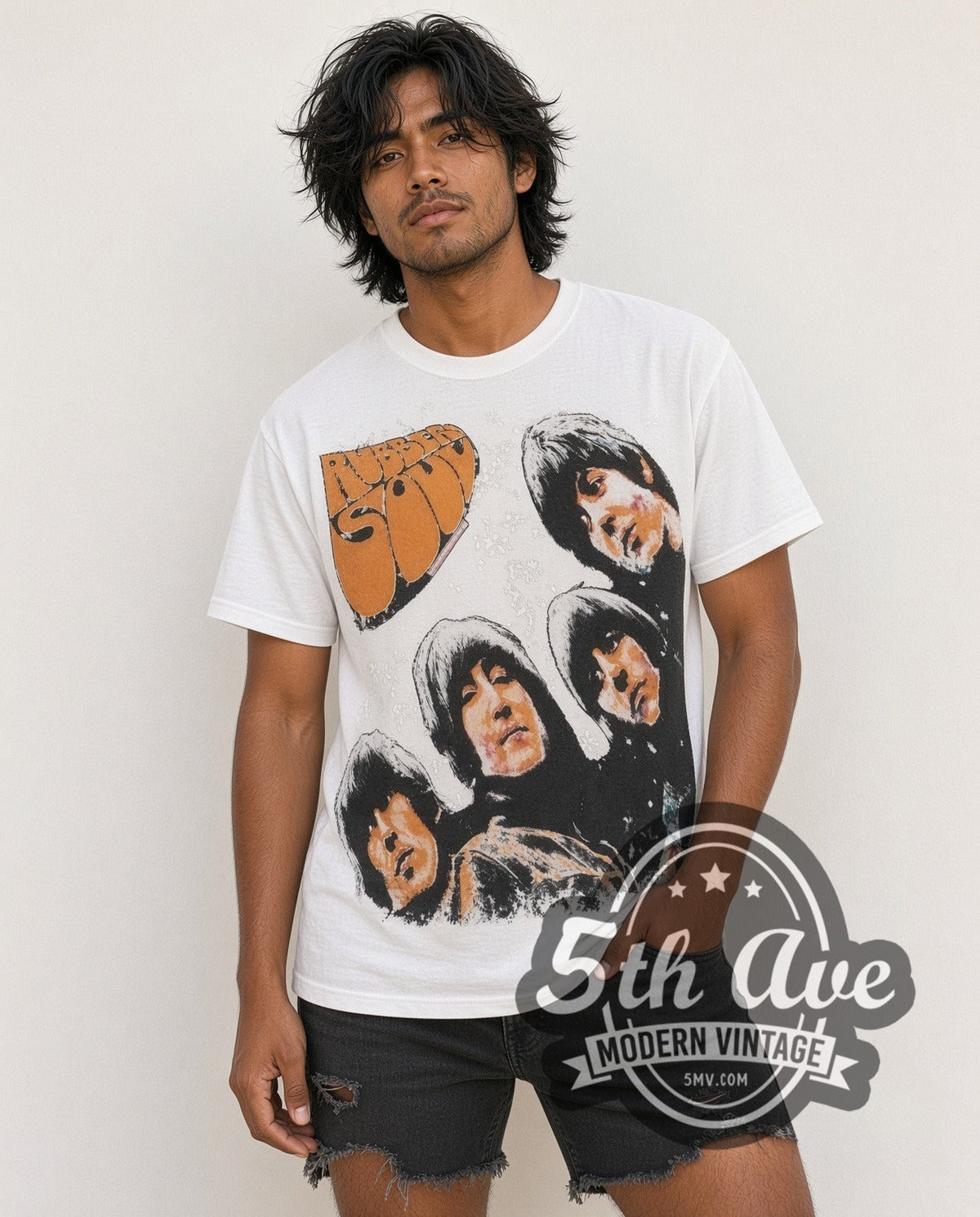 Model wearing The Beatles Rubber Soul all-over-print vintage band t-shirt in white