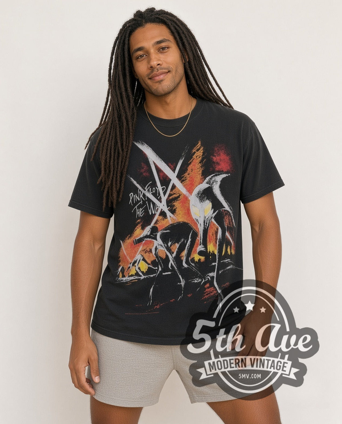 Model wearing the Pink Floyd The Wall Hammers all-over-print vintage band t-shirt in black