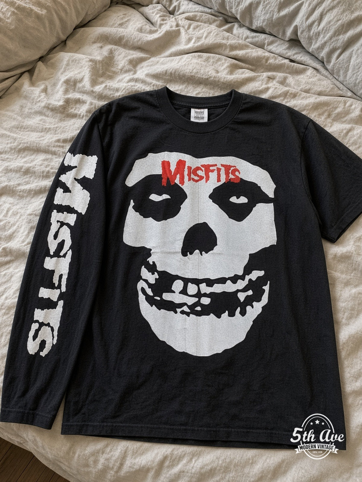 ETS LS 42 Misfits Skull long sleeve vintage tee laid on a bed